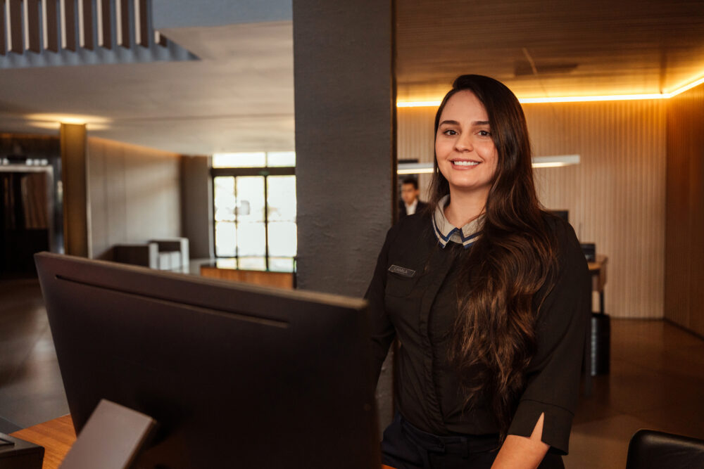 man in business casual shirt smiling